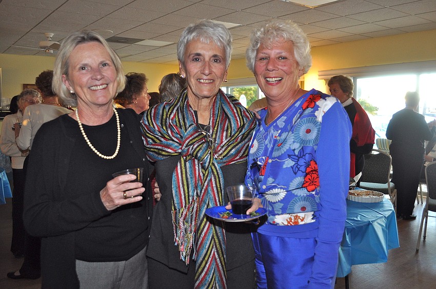 Ingrid Crites, Francine Gietl and Gina Lopez engage in a little bit of girl talk.