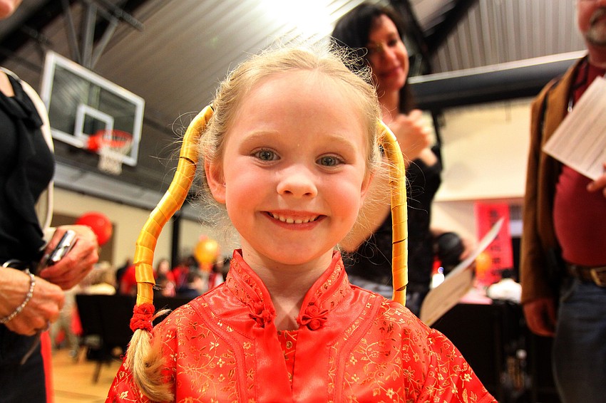 Tori Greenlaw, 6, from St. Stephen's Episcopal School smiles prior to going on stage on Saturday, Jan. 29 at the 2011 GCAA Chinese New Year Celebration held at T.J. Johnson Youth Center.