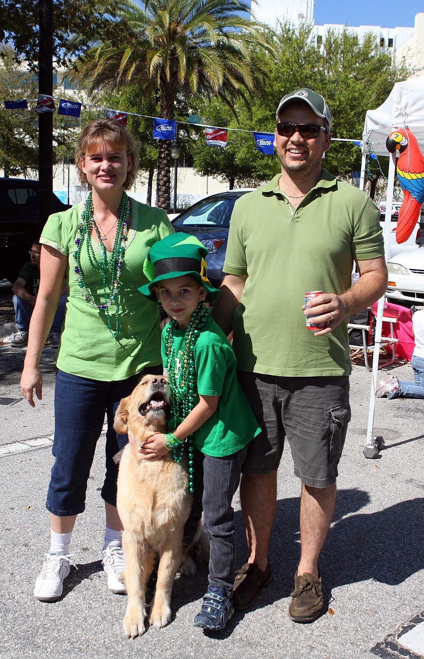 Sharon, Connor and Rick Rutherford along with their dog, Sophie, enjoy being green on Saturday, March 12 at the Sham Rock Festival on Hillview.