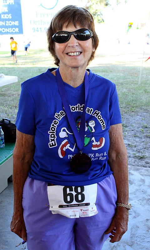Barbara Keddie, who turned 83 on race day, received a 1st place medal.