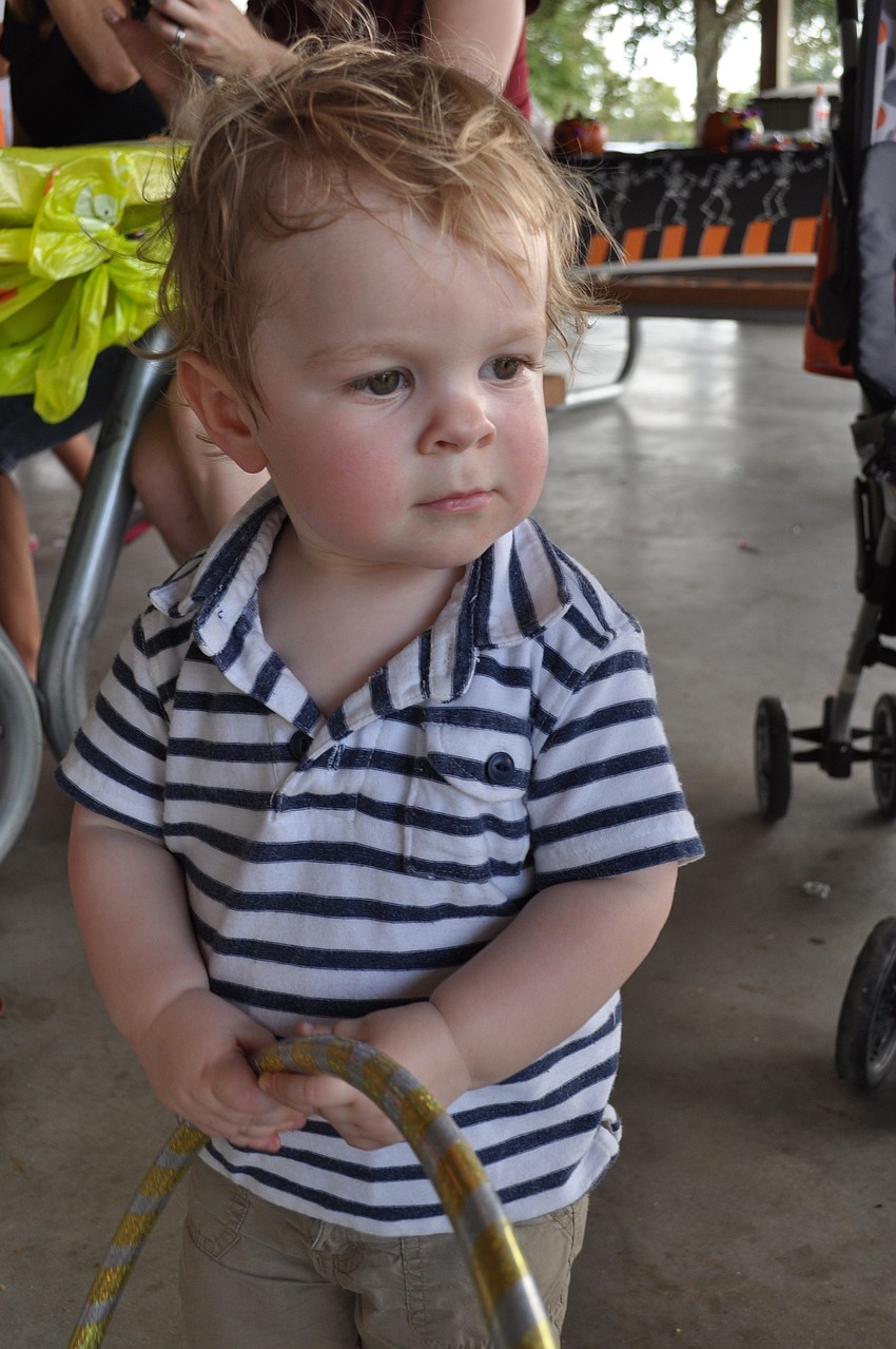 Jasper Ray, 20 months, wouldnâ€™t let go of his hula hoop.