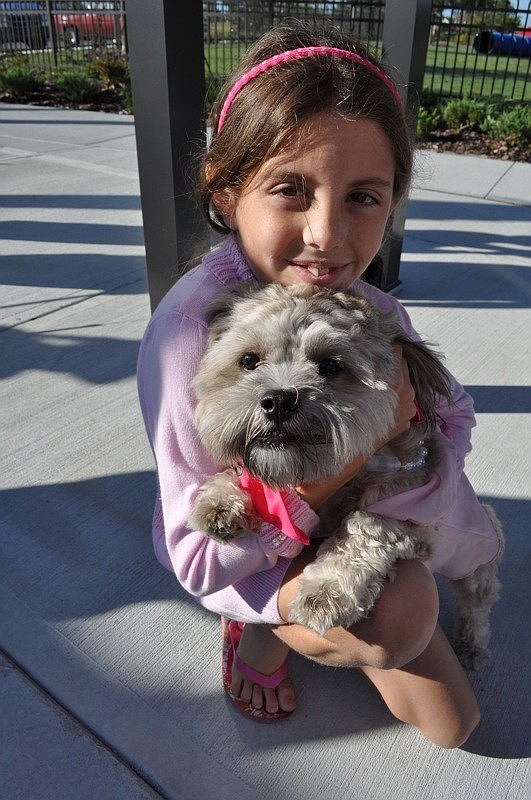 Taylor Williams, 9, had a good time with her dog, Brownie.