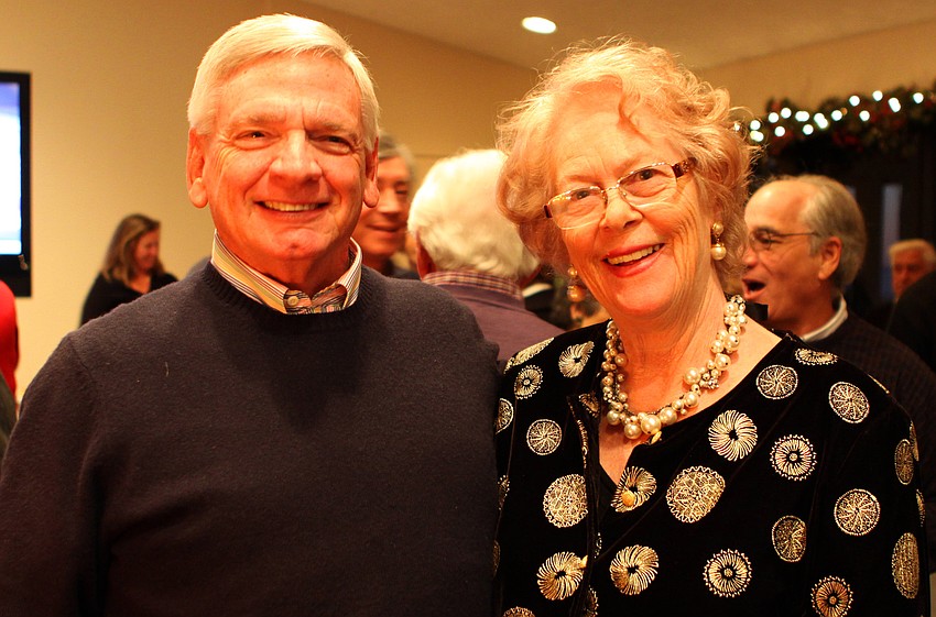 Bob Neudorfer and Gudrun Swanson catch up at the Welcome Back Holiday Party at Seaplace.