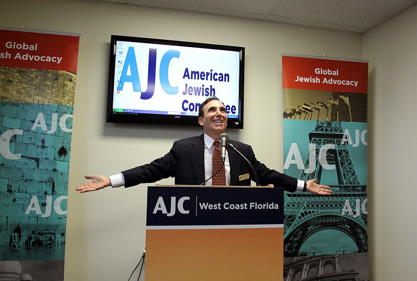 Brian Lipton raves over the new AJC office inside the Bank of America Building during AJCâ€™s Grand Opening Cocktail Party Thursday evening.