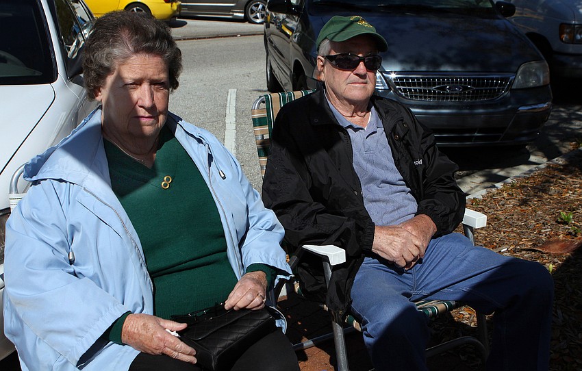 Eileen and Mike Daly sit in a shaded area waiting to hear some music on Saturday, March 12 at the Sham Rock Festival on Hillview.