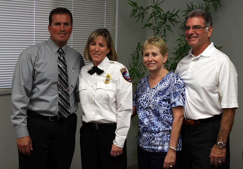 Newly appointed deputy chief, Sandi Drake with her family.