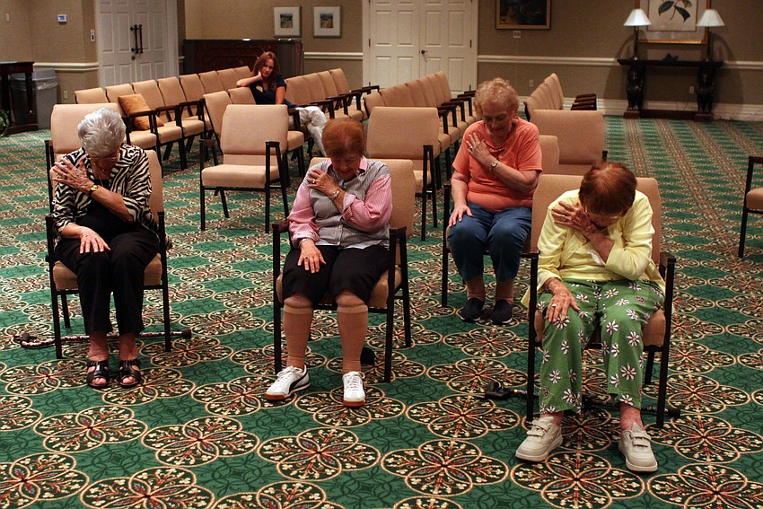 Gert Wiederhorn, Bea Michaels, Delores Godwin and Shirley Dinkin take a seated bow.