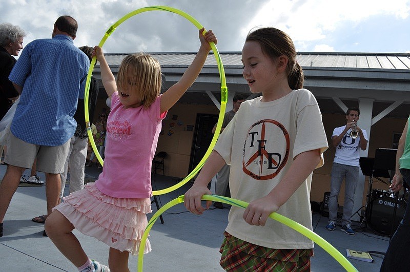 Lily Vale, 6, and Sara Green, 5, danced to the live music.