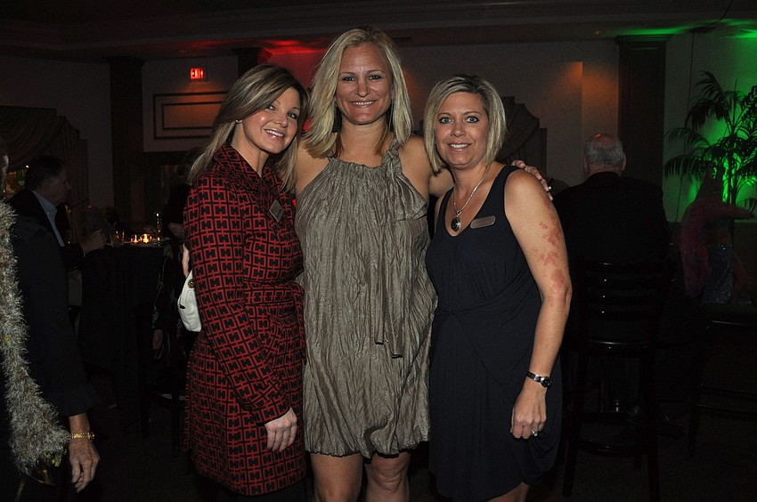Katie Jordan, Admiral Travel co-owner Malaka Hilton and Jolene DiRocco