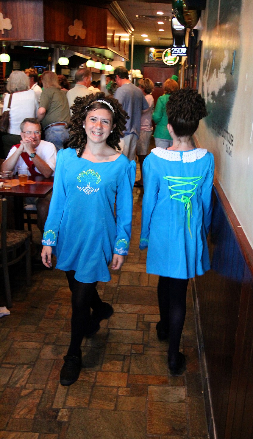 Alexis, 11, and Kelsey, 13, Worth perform inside Lynches Pub on Thursday, March 17 for their annual St. Patrick's Day party.