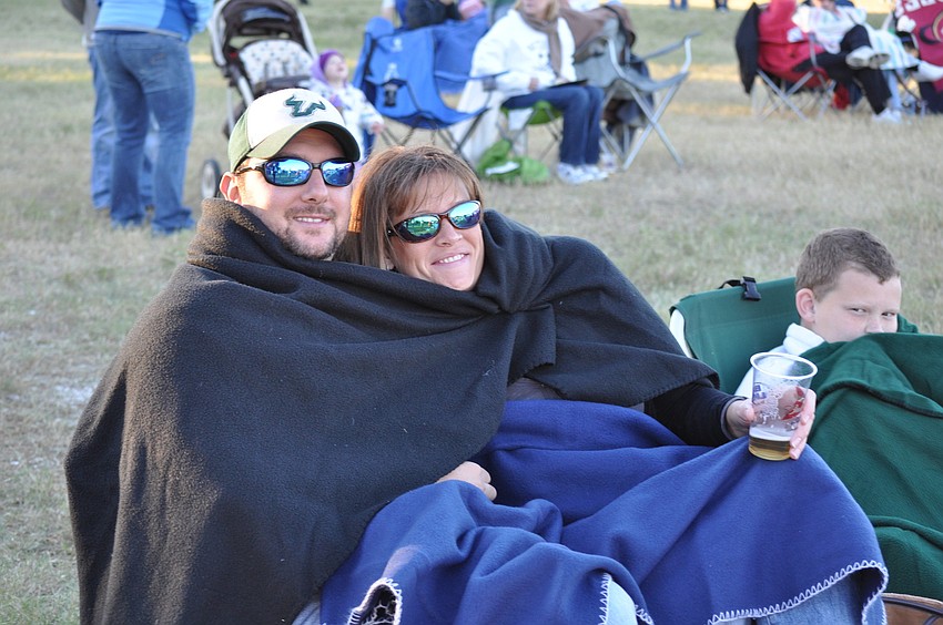 Lawrence Knowles and Megan Euribe stay warm