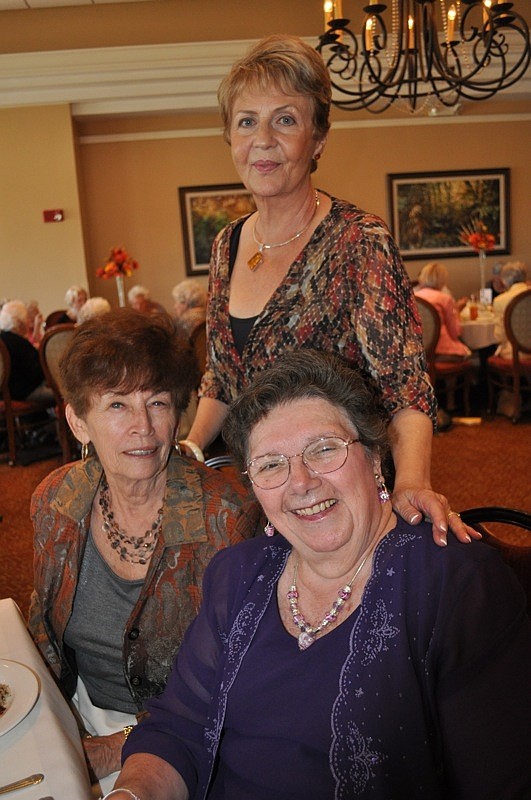 Carol White and Rose Viccora ate lunch with Elisabet Saladino, standing, and friends.
