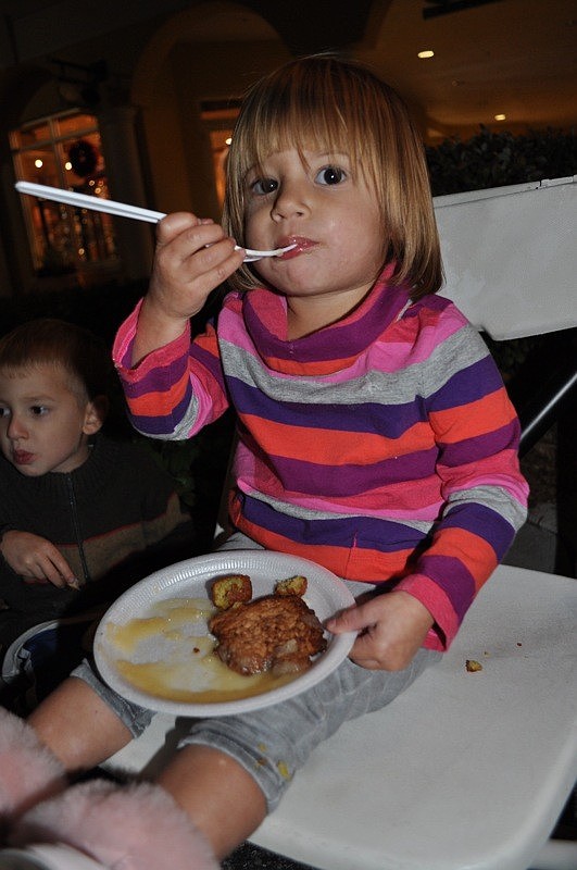 Reese Stroud, 2, feasted on traditional Jewish treats with her family.