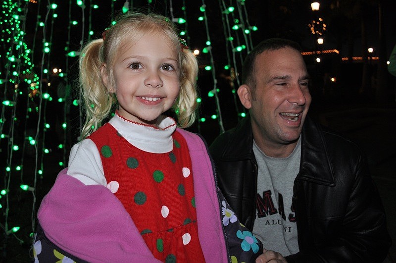 Four-year-old Dakota Holler, pictured with her dad, Tim, could hardly keep her eyes off the dancers.