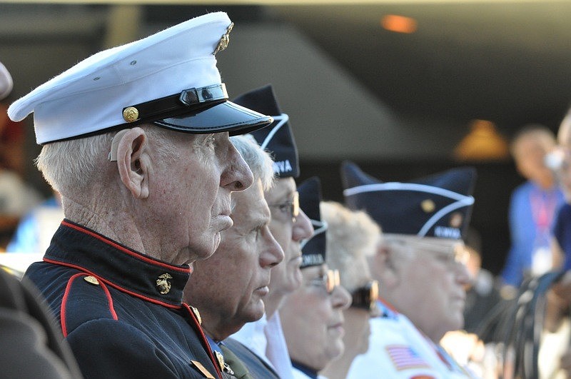 U.S. Marine veteran Hurb Thompson, left, is a survivor or Iwo Jima.