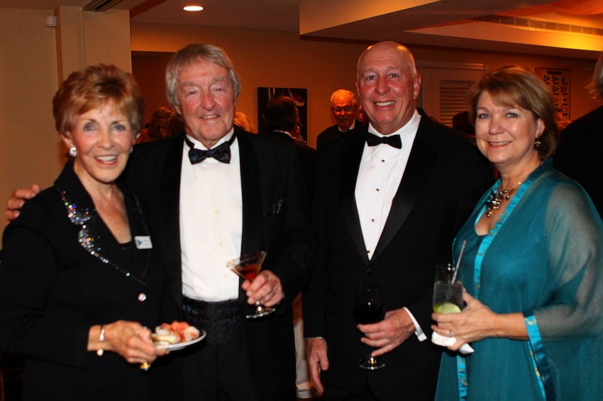 Dorothea Morris, Bernie Boutet pose with Jimmy and Lynn Hayes.
