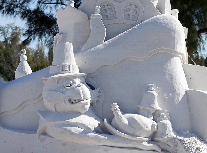 A sand Grinch created by Brad Goll and John Woodworth. Their sand sculpture was entitled 