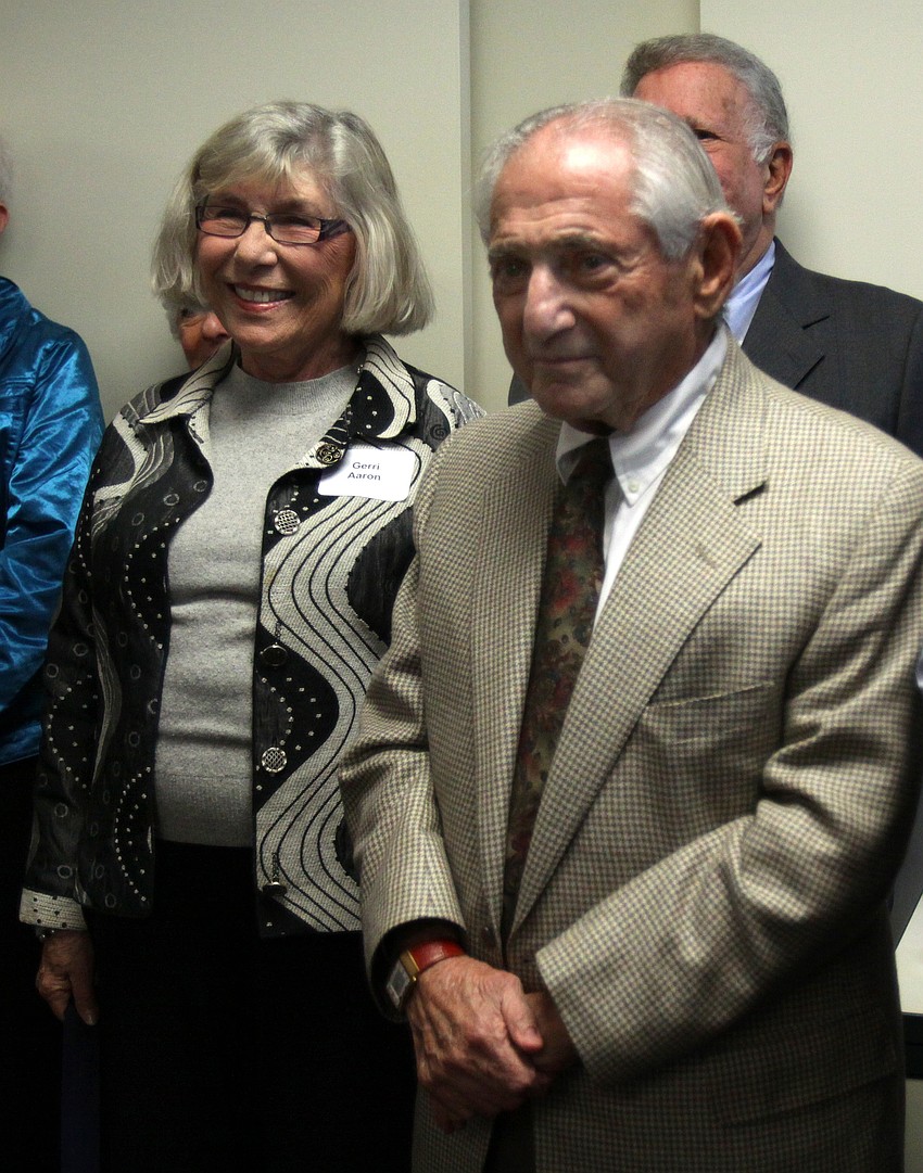 Gerri Aaron and Nate Benderson stand next to one another during the AJCâ€™s Grand Opening Cocktail Party. Benderson was the recipient of the 2010 AJC Human Relations Award and Aaron will be the recipient of the 2011 award.
