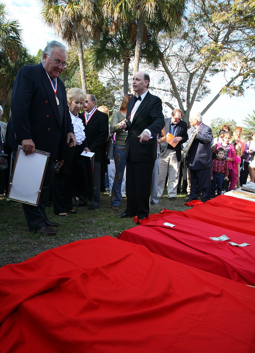 Chuck Sidlow points out to Jean â€œTarazanâ€ Zerbini how his comment during his acceptance speech about leaving dollars on his plaque on the ring would be appreciated, actually gained him a few bucks.