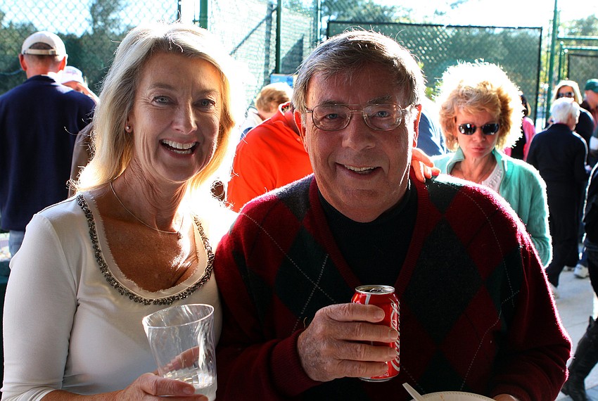 Linda Gillott and Doug White enjoy themselves on Friday, Jan. 28 during Longboat Key Public Tennis Center's Chili Cook-off competition.