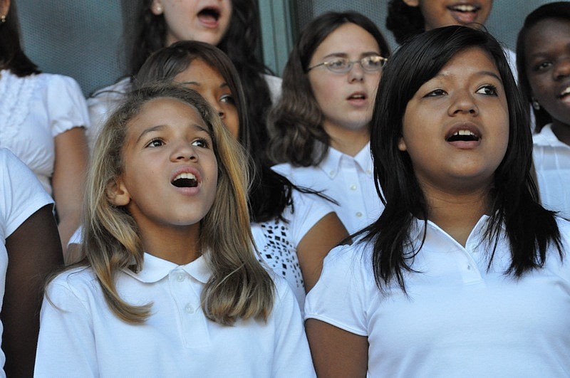 Miya Yawn, 12, and Sara Vega, 14,  proudly sang 