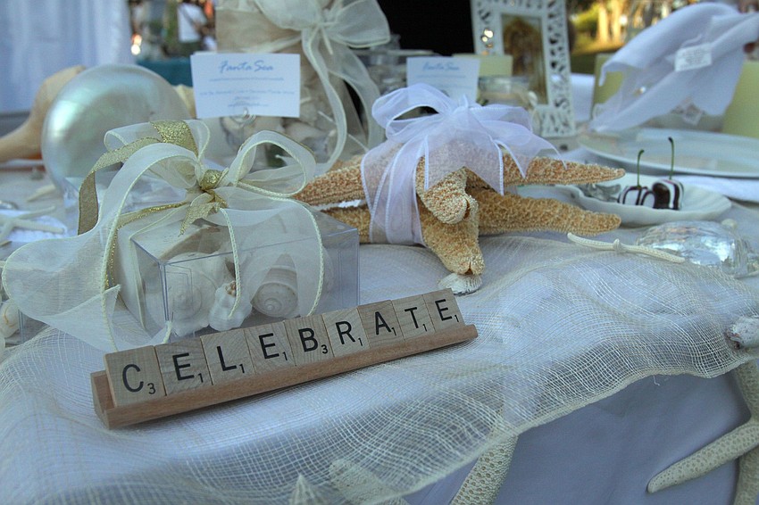 FantaSea's table had possible decorations for a beach wedding on Saturday, Feb. 26, at Armands Circle's Weddings in Paradise Circle of Love event.