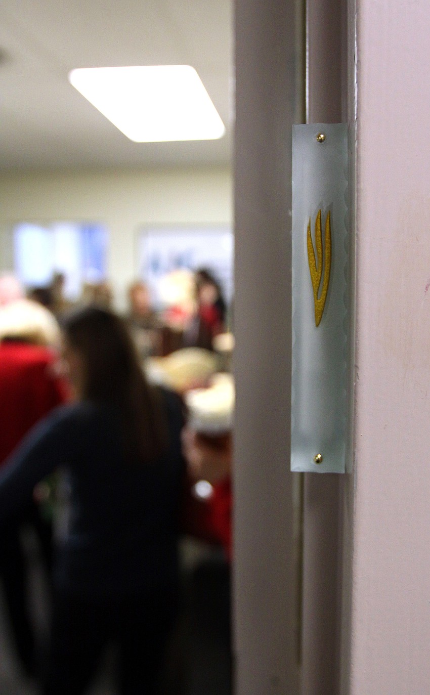 The mezuzah, donated by the Sieglers and put up by Nate Benderson.