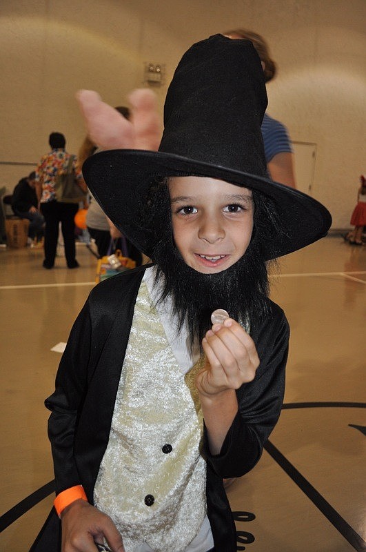 Beck Stout, 9, offered a penny to passersby.