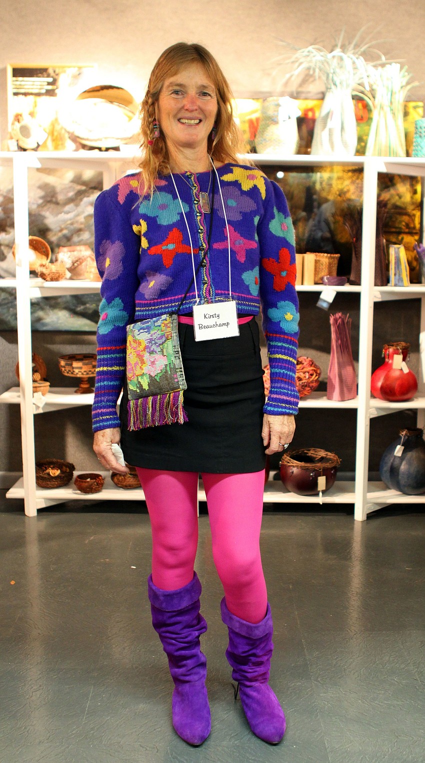 Artist Kirsty Beauchamp wears one of her sweaters on Thursday, Feb. 11 that she is selling at the Fabulous Arts Boutique.
