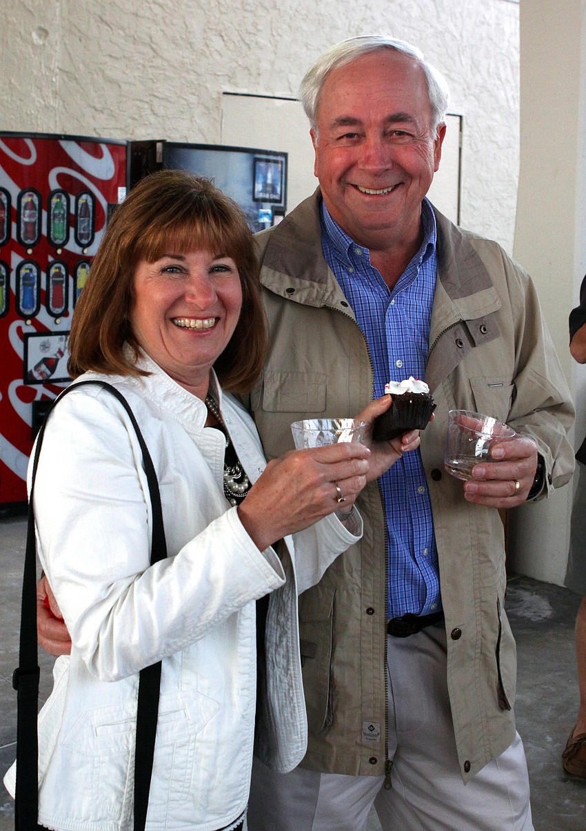 Debbie and Dennis Bowgren, married 39 years, enjoy their cupcake after the Say I Do, Again ceremony, Monday, Feb. 14 on Siesta Key Beach.