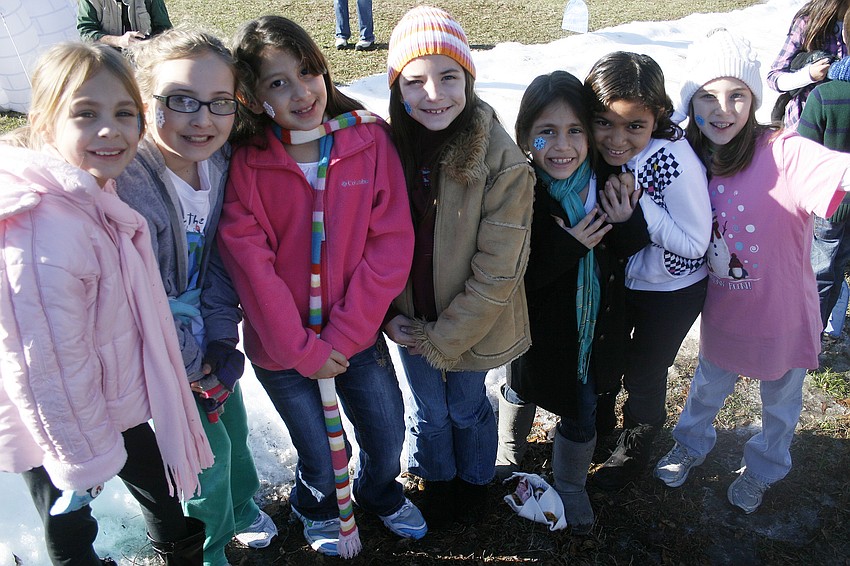 Students bundled up in mittens, winter hats and coats for the celebration.