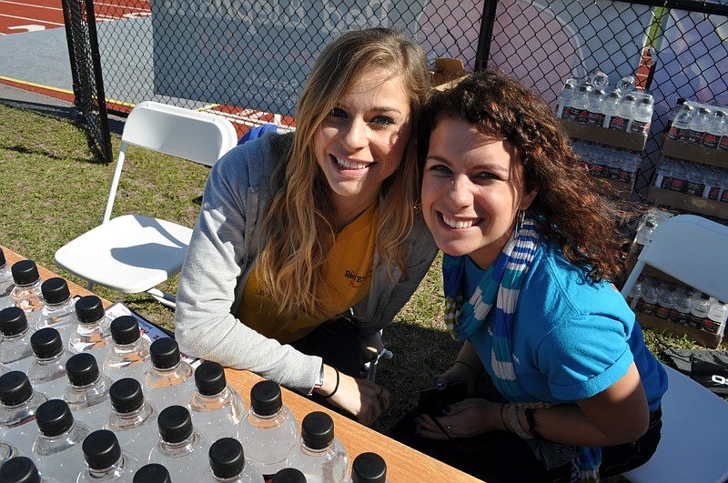 The Red Elephantâ€™s Kaitlyn Bell and Hannah Waters passed out bottled water and coupons.