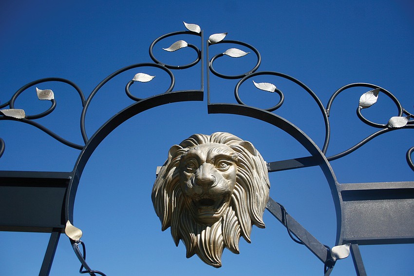 This lion head greets habitat visitors at the front gate.