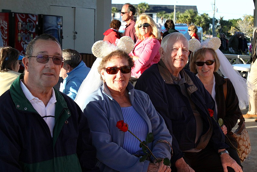 Dan and Sue Klinedinst, married 54 years, and their friends Tom and Linda Doyle, at the Say I Do, Again ceremony, Monday, Feb. 14 on Siesta Key Beach. The women wore Minnie Mouse wedding veils at the ceremony.