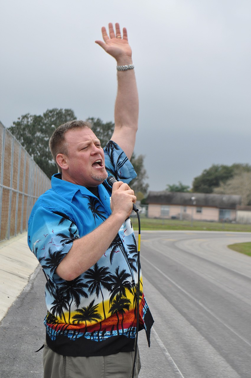 Principal Joe Bazenas gets the students pumped up.