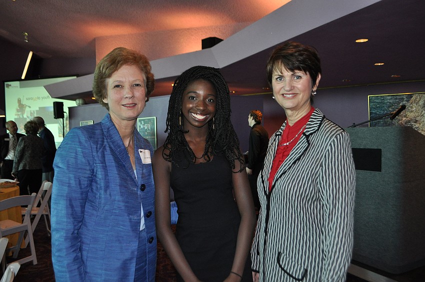 Lori White, superintendant of Sarasota County Schools; Simone Curry, a Booker High School junior and MC for the luncheon; and Laurey Stryker, initiative manager for the Patterson Foundation