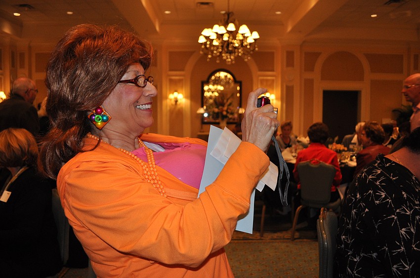 Murders She Wrote writer and director Maria Buckley came out in costume before the show to get pictures of the audience.