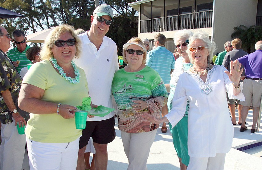 Mary Beth and Charlie Protzman, Patricia Bell, Joanne Harris and Jillson Rolland pose together on Thursday, March 17 during Cedars West's St. Patrick's Day party.