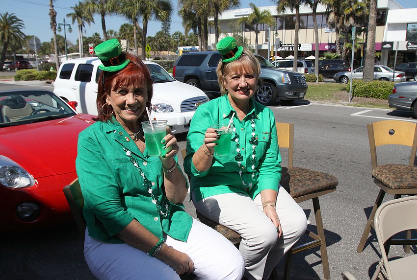 Ethna and Chris Lynch enjoy some green beer on Thursday, March 17 during their annual St. Patrick's Day party at Lynches Pub on St. Armands.