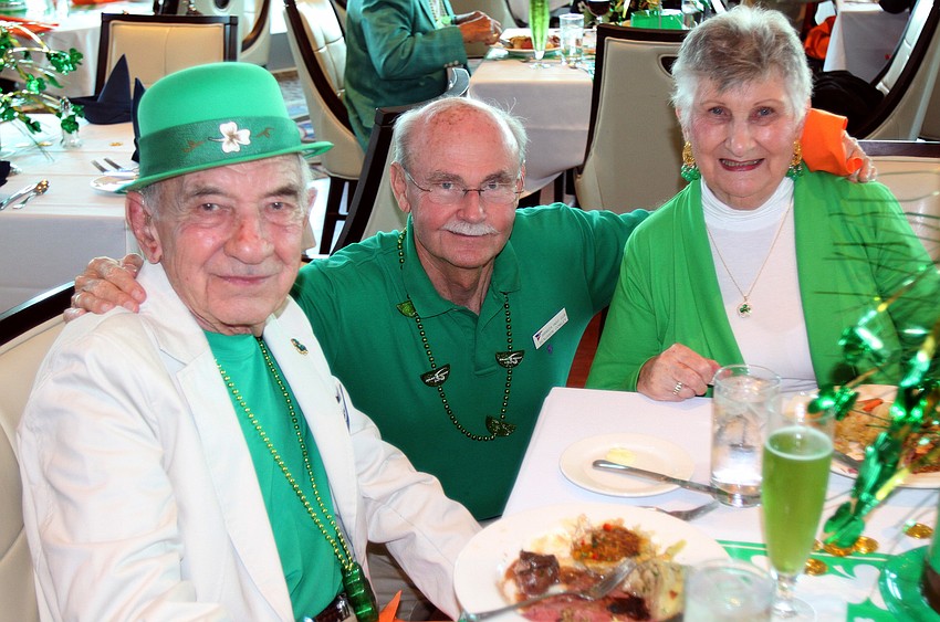 Tom Quigley, Ben Cowley and Mary Quigley enjoy themselves at the Sarasota Yacht Club's St. Patrick's Day event. Cowley and Mary Quigley were the chairs for the event.