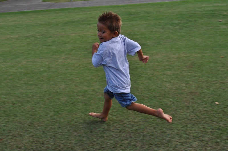 Mark Cubas played tag with his twin sister Abby, not pictured, and other children.