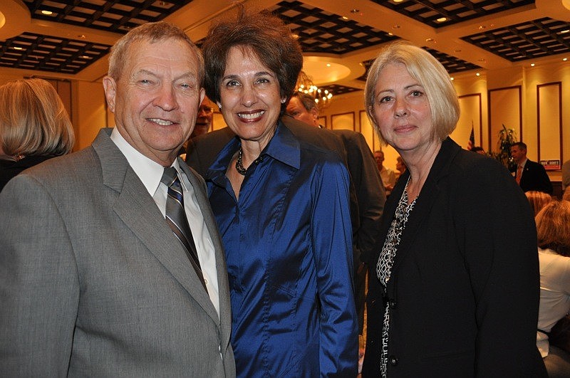 Sen. Mike Bennett with his wife Dee and event sponsor Artis Wick