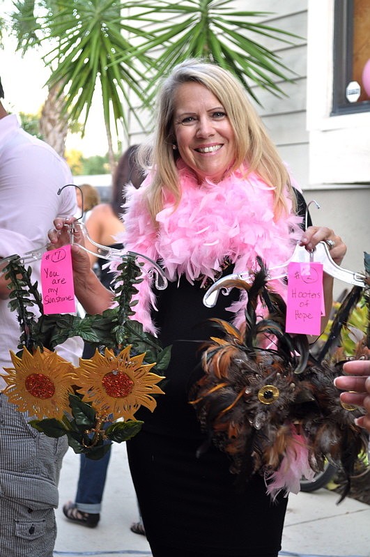 Rebecca Wilds models two entries for the bra-decorating contest.
