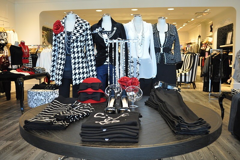 White House Black Market is featuring lots of red accents.