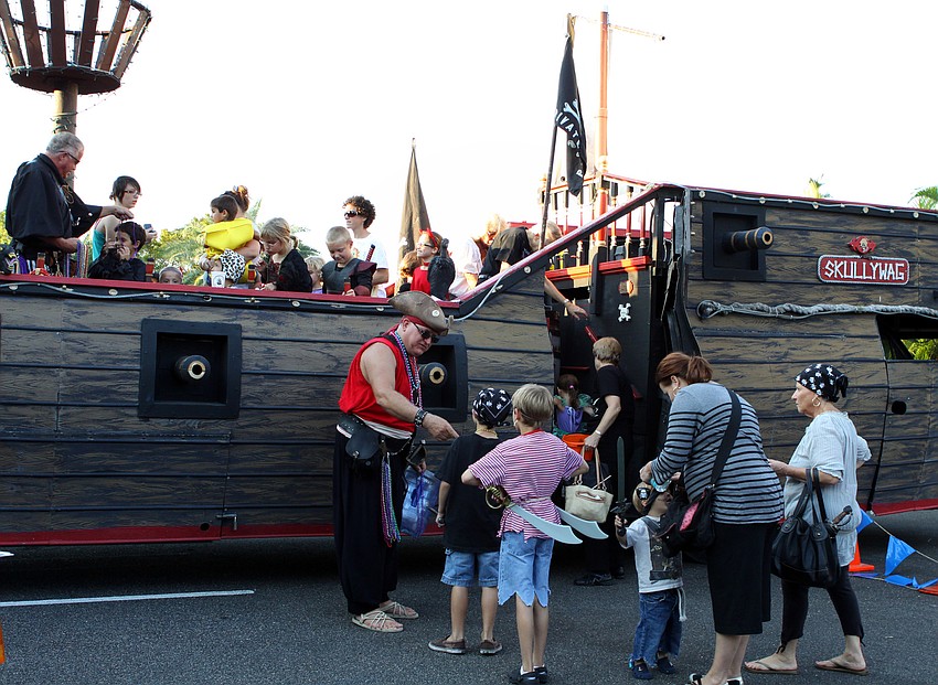 Children go on board â€œSkullywagâ€ prior to going inside Mote.