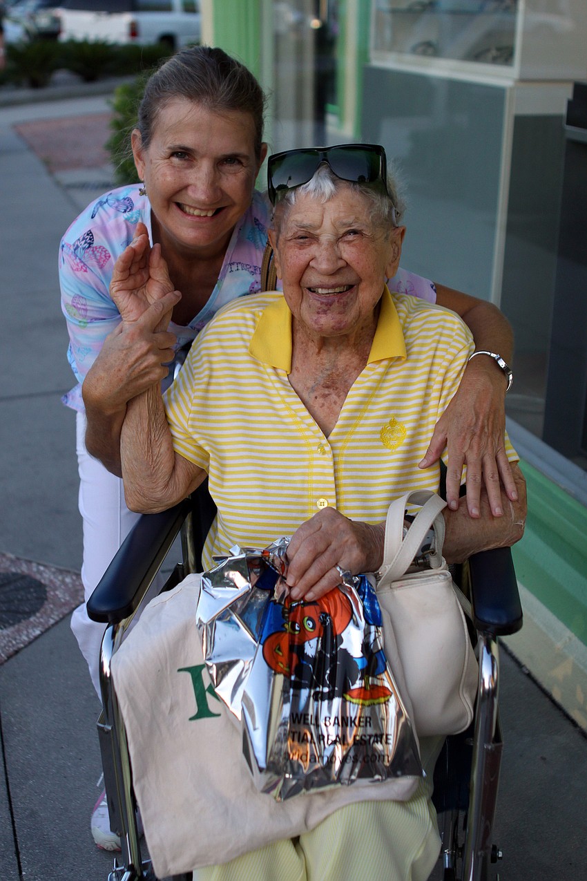 Terry Riden and Gene Steen, 103, enjoy Halloween together trick-or-treating around the circle on St. Armand's Key.