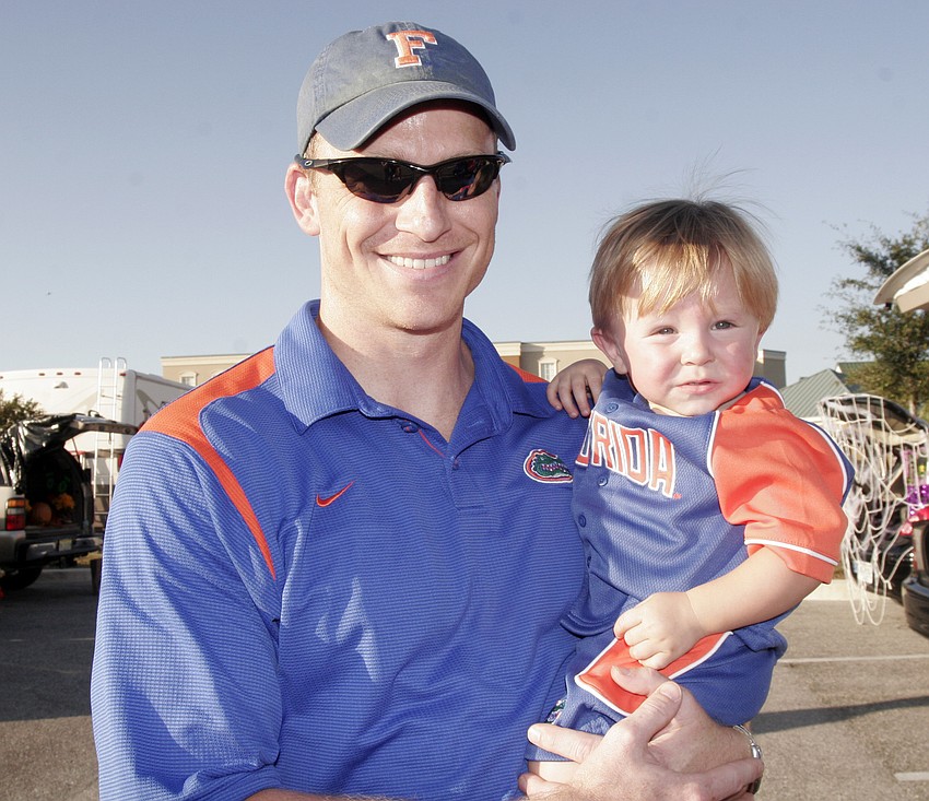 Michael Springer and his 14-month-old son, Joseph, showed their team spirit.