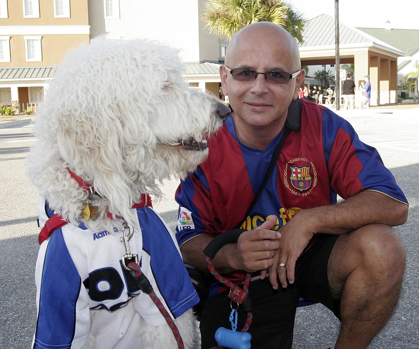 Pedro Hernandez brought his dog, Rocky, to the festival.