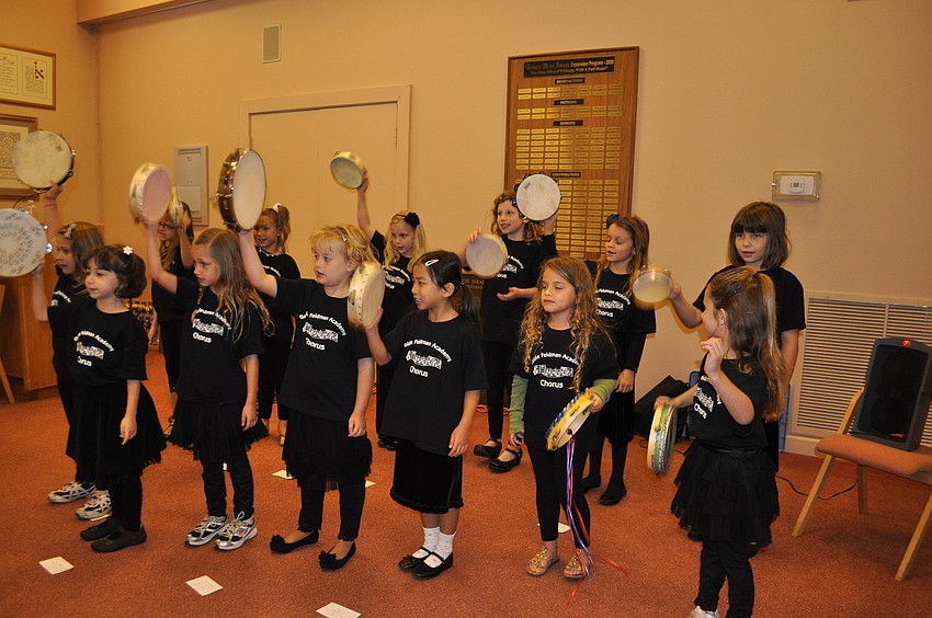 Students from the Goldie Feldman Academy present a song about Hannukah.