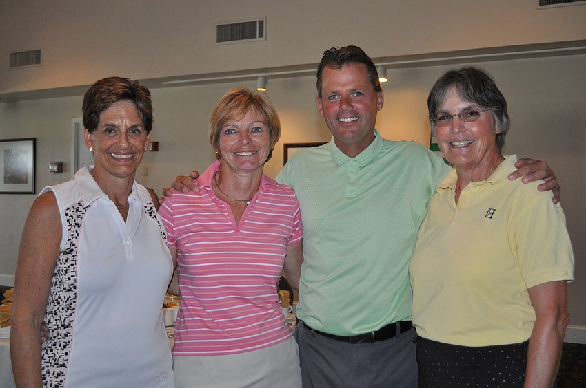 Three players from the winning foursome, Jayne Weiss, Regina Repenning and Carol Meese, with the Director of Golf, Terry O'Hara.